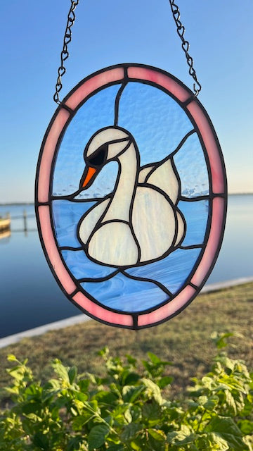 Iridescent Swan Stained Glass Suncatcher – Elegant Bird Window Hanging – Handmade Oval Glass Art with Soft Pink Border