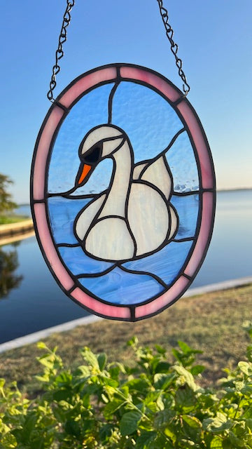 Iridescent Swan Stained Glass Suncatcher – Elegant Bird Window Hanging – Handmade Oval Glass Art with Soft Pink Border