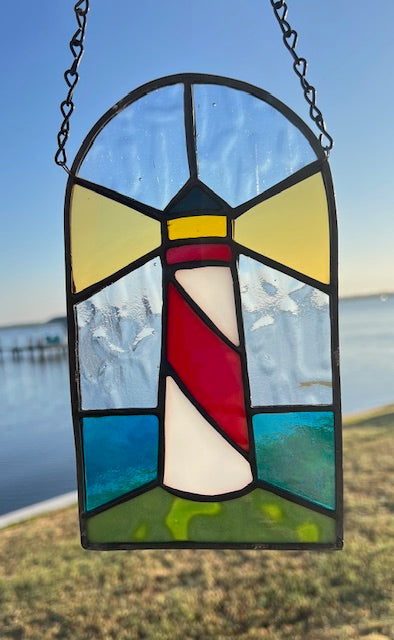 Stained Glass Lighthouse Suncatcher – Red &amp; White Coastal Beacon with Iridescent Blue Waves – Nautical Window Hanging