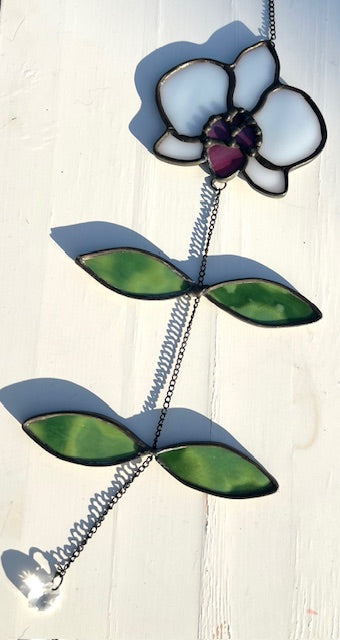 Stained Glass White Orchid Suncatcher – Pink Center Flower, Black Chain Movement Leaves, Black Patina, Handmade USA Botanical Window Art