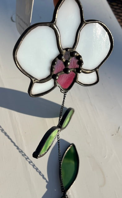 Stained Glass White Orchid Suncatcher – Pink Center Flower, Black Chain Movement Leaves, Black Patina, Handmade USA Botanical Window Art
