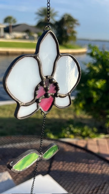 Stained Glass White Orchid Suncatcher – Pink Center Flower, Black Chain Movement Leaves, Black Patina, Handmade USA Botanical Window Art
